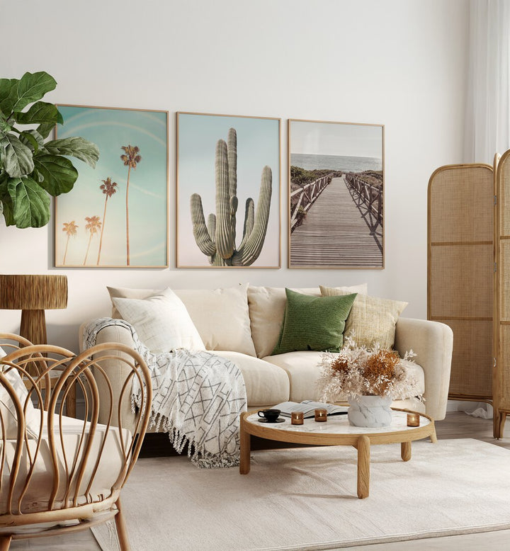 Transform your space with the SUNNY CALI SAGUARO SET, SET OF 3 PAINTINGS featuring vibrant cacti and sunset hues.