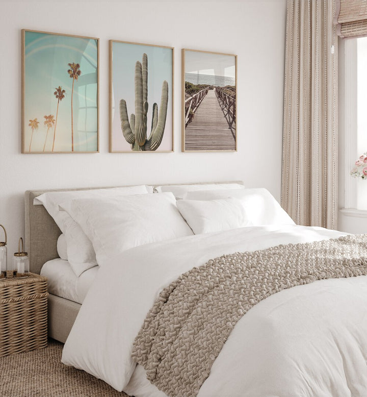 Enhance your decor with the SUNNY CALI SAGUARO SET, SET OF 3 PAINTINGS showcasing vibrant cacti and sunsets.