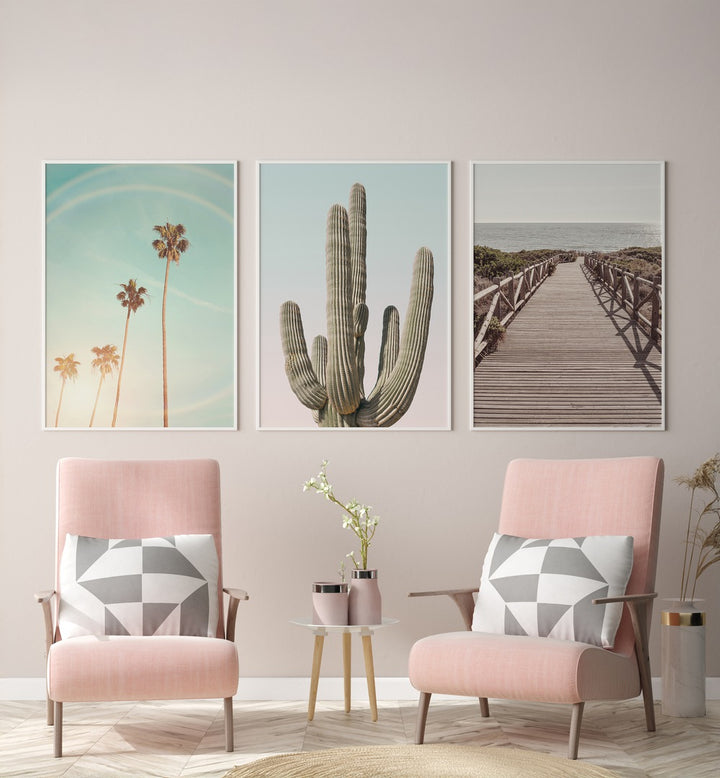 Enhance your decor with the SUNNY CALI SAGUARO SET, SET OF 3 PAINTINGS showcasing vibrant cacti and serene landscapes.
