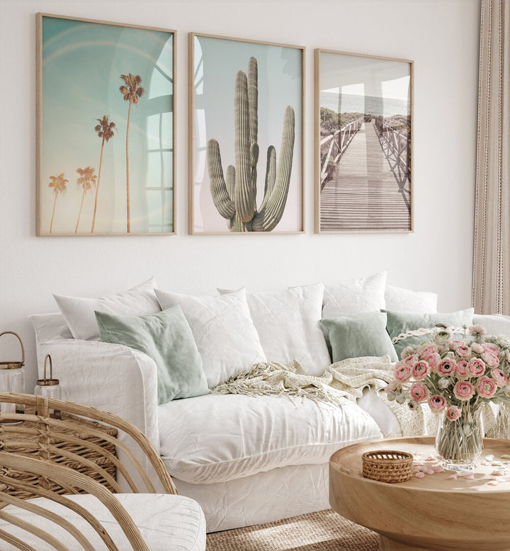 Transform your space with the SUNNY CALI SAGUARO SET, SET OF 3 PAINTINGS featuring vibrant cacti and sunset vibes.