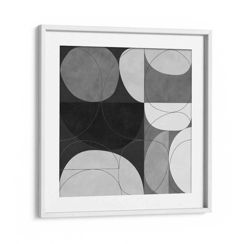SHAPES BW III, ABSTRACT PAINTINGS by Ana Rut Bre features captivating monochromatic geometric designs in a white frame.