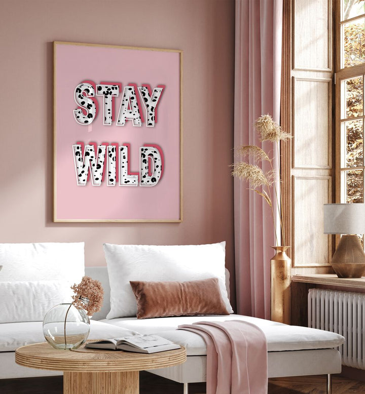 Stylish "STAY WILD, FASHION POSTERS" artwork by Martina enhances contemporary interiors with playful elegance.