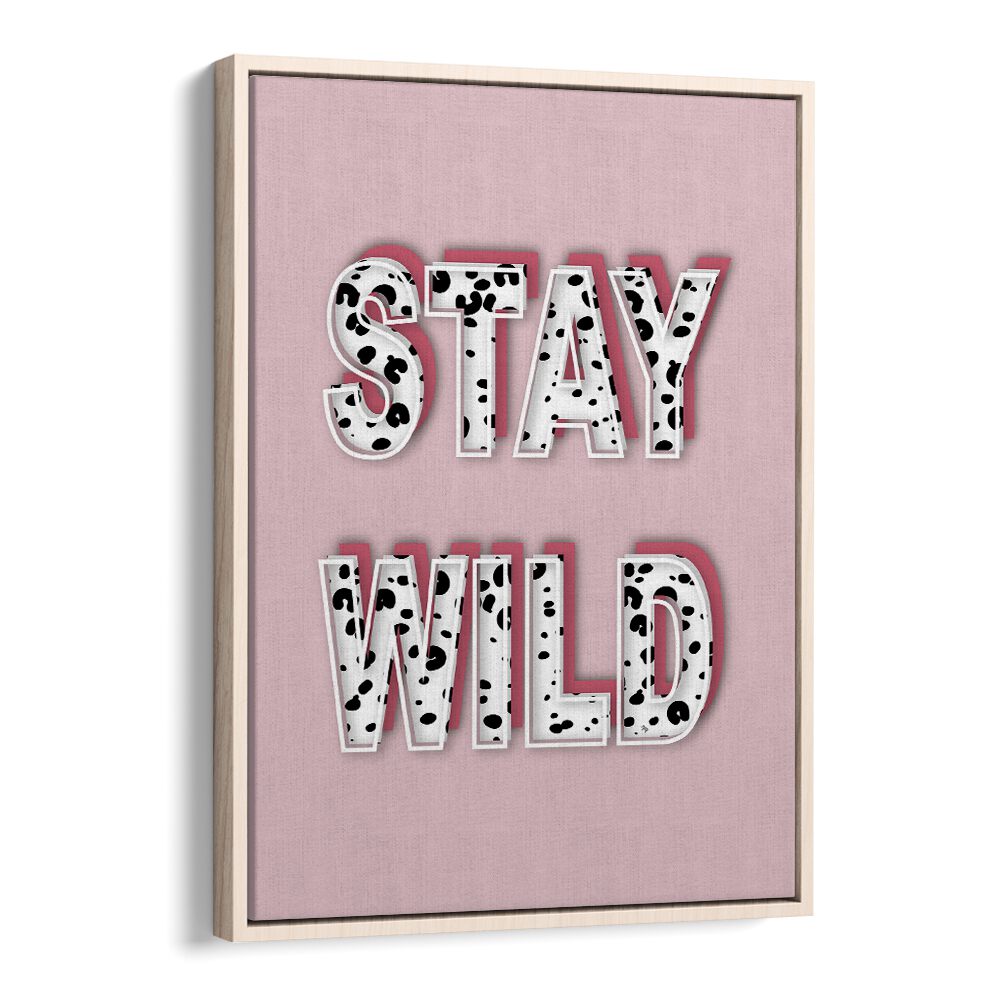 Stylish STAY WILD, FASHION POSTERS in a chic oak floater frame, perfect for transforming your space with elegance.