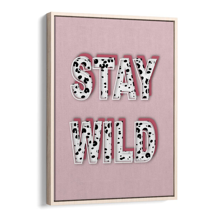 Stylish STAY WILD, FASHION POSTERS in a chic oak floater frame, perfect for transforming your space with elegance.