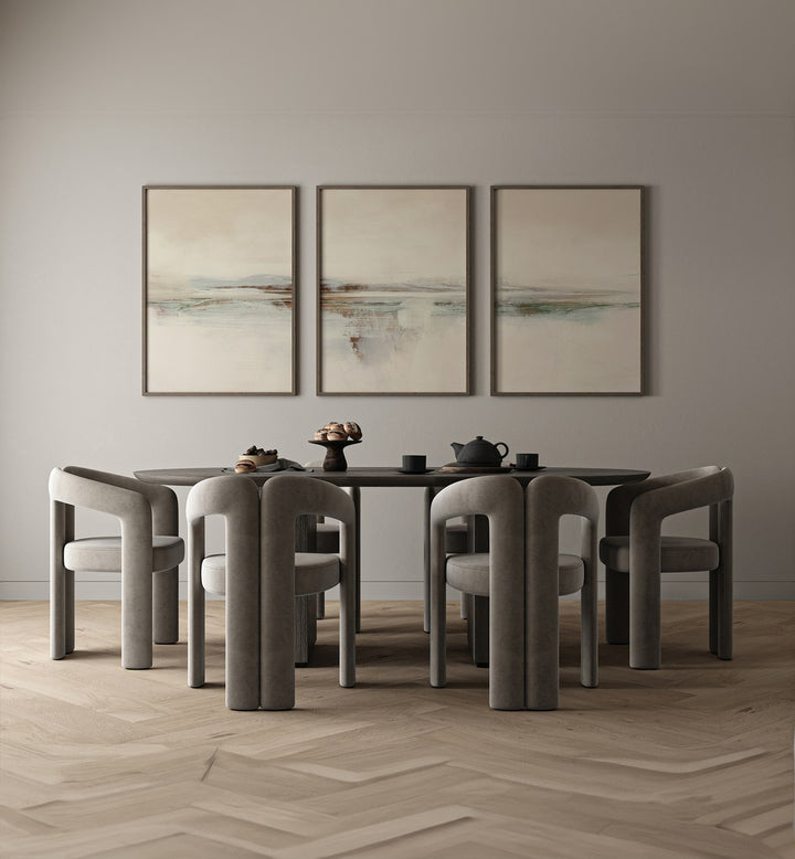 Elegant dining area featuring the SUNSET ABSTRACTION SET, SET OF 3 PAINTINGS by Dan Hobday, embodying serenity and style.