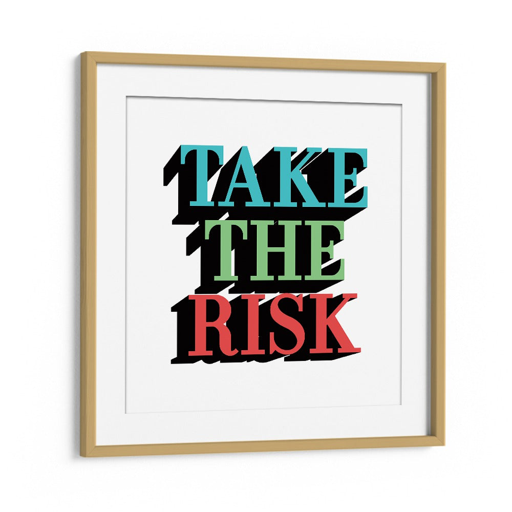 Stylish TAKE THE RISK, QUOTES poster in an oak frame, perfect for inspiring your living space with motivation.