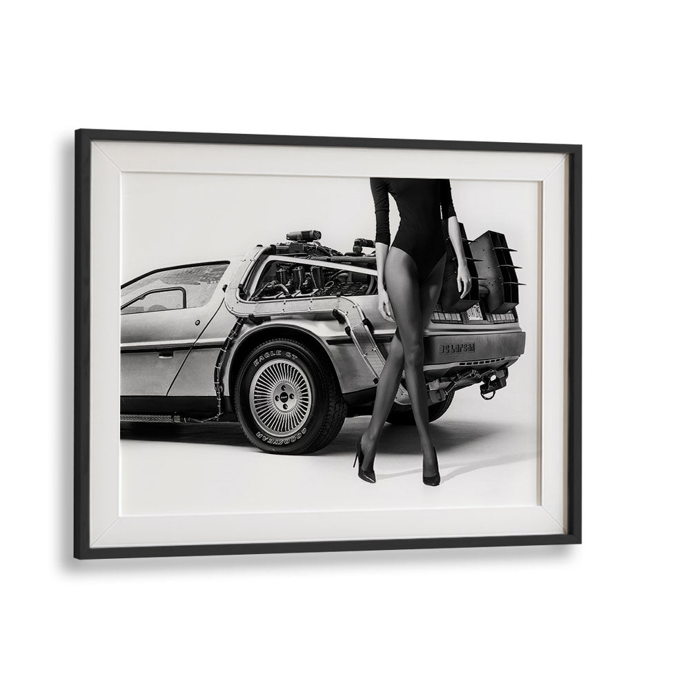 Stylish fine art print "THE FUTURE IS FEMALE II, PHOTOGRAPHY PRINTS" by David Drake featuring a sleek car and elegant figure.