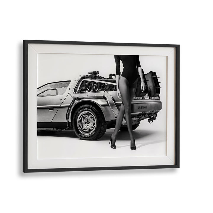 Stylish fine art print "THE FUTURE IS FEMALE II, PHOTOGRAPHY PRINTS" by David Drake featuring a sleek car and elegant figure.