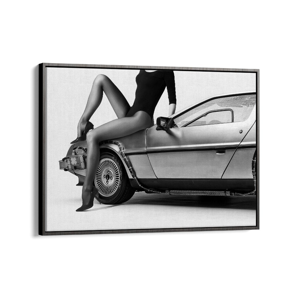 Stylish black and white photography print featuring a model on a classic car, representing "THE FUTURE IS FEMALE PART III, PHOTOGRAPHY PRINTS."
