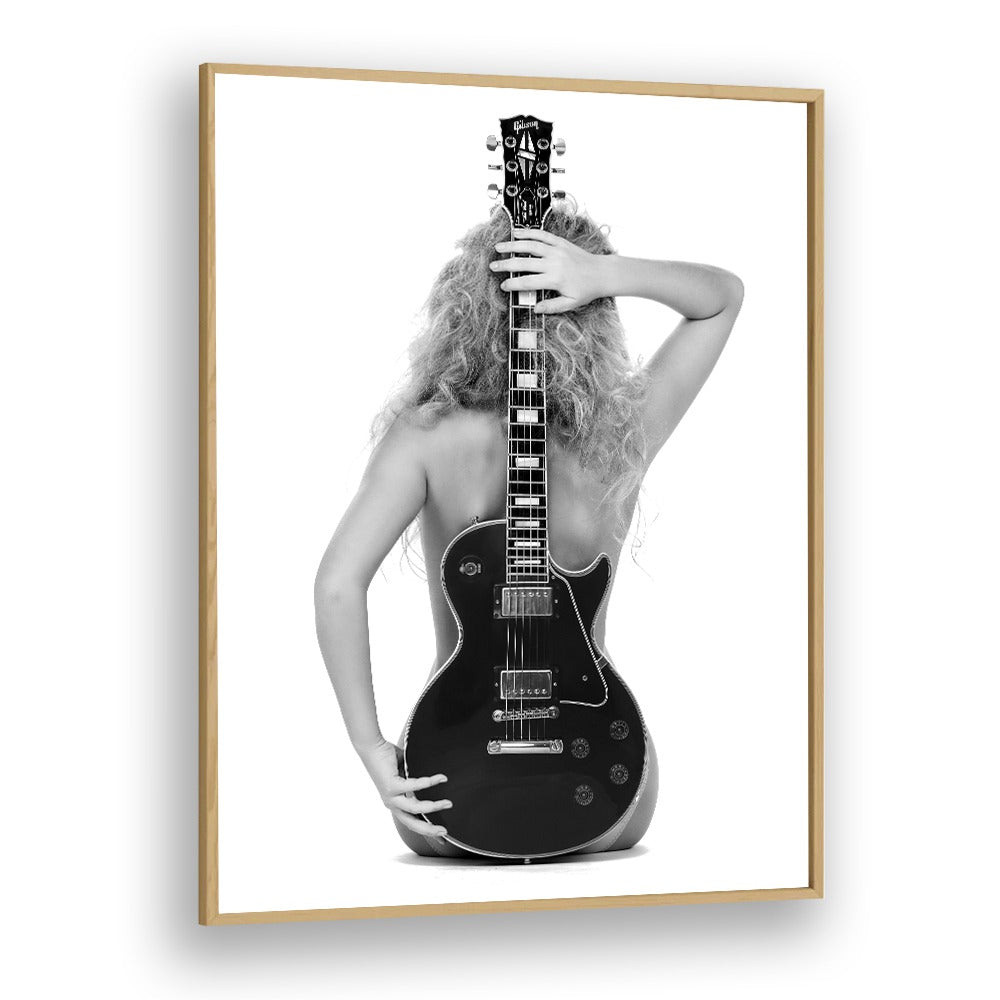 Stylish "THE LES PAUL , PHOTOGRAPHY PRINTS" by David Drake captures elegance in fashion photography framed beautifully.