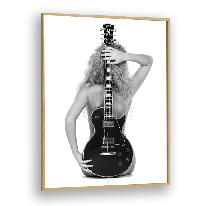 Stylish "THE LES PAUL , PHOTOGRAPHY PRINTS" by David Drake captures elegance in fashion photography framed beautifully.