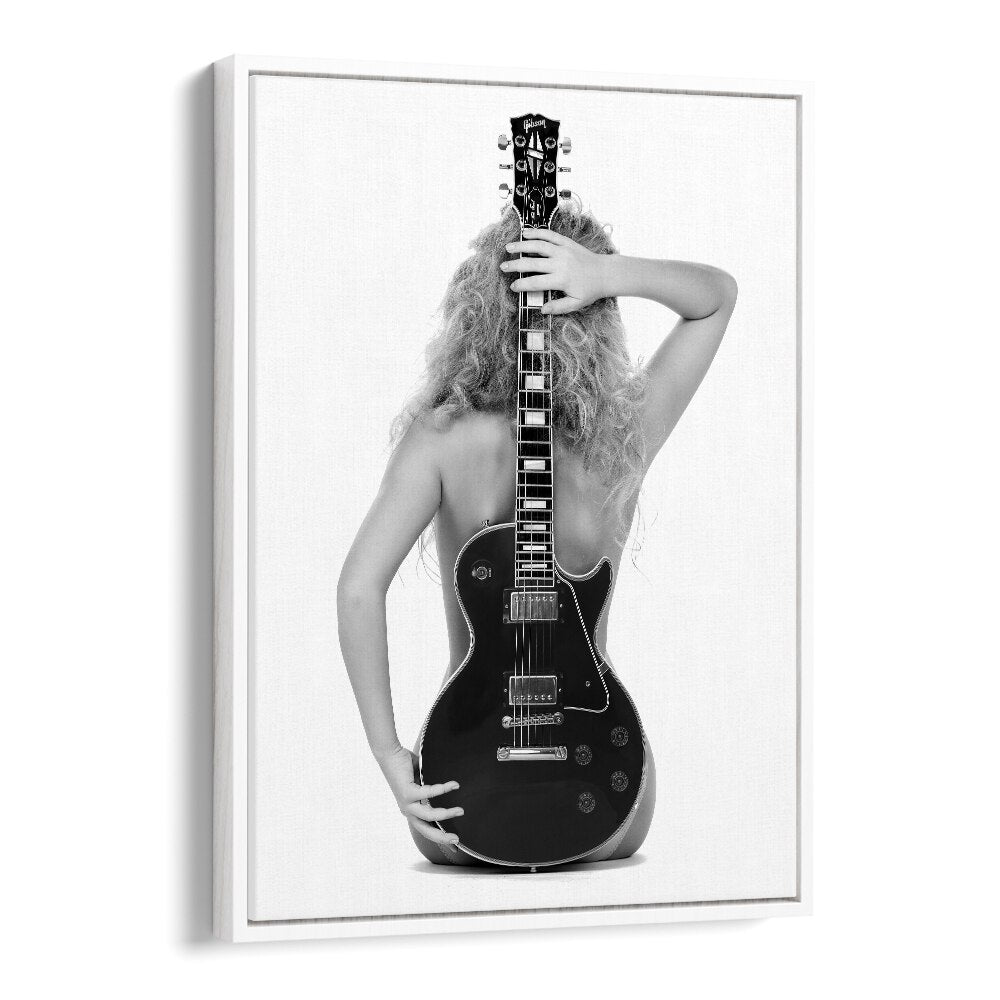 Stunning black-and-white "THE LES PAUL, PHOTOGRAPHY PRINTS" featuring a model with a guitar by David Drake.
