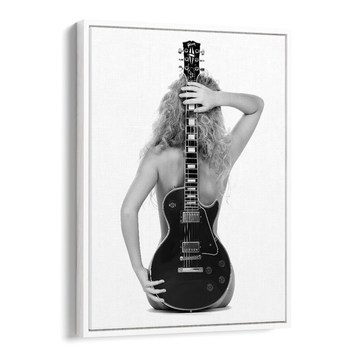 Stunning black-and-white "THE LES PAUL, PHOTOGRAPHY PRINTS" featuring a model with a guitar by David Drake.