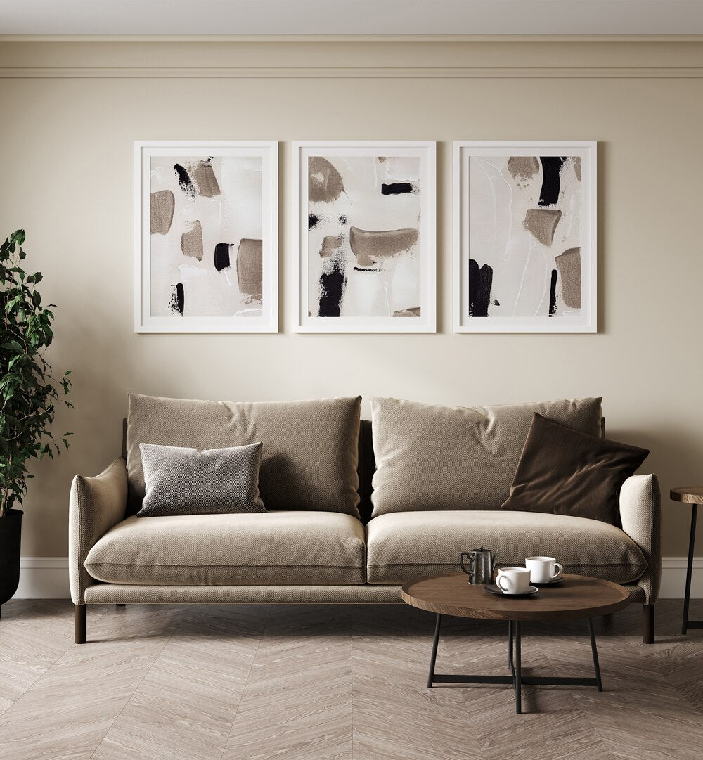 Stylish living room featuring the TIMELESS TEXTURE SET, SET OF 3 PAINTINGS, adding elegance and character to the space.