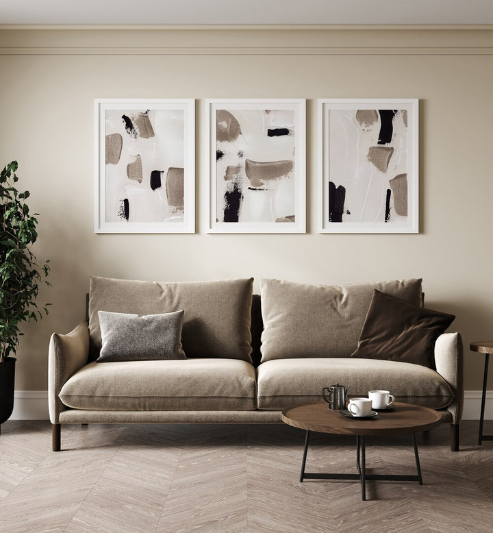 Stylish living room featuring the TIMELESS TEXTURE SET, SET OF 3 PAINTINGS, adding elegance and character to the space.