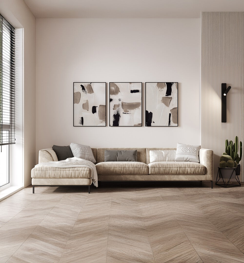 Stylish living room featuring the TIMELESS TEXTURE SET, SET OF 3 PAINTINGS that enhance any decor effortlessly.