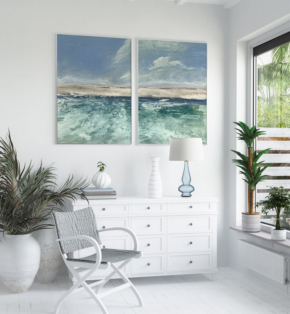 Transform your space with the VOYAGE SET, SET OF 2 PAINTINGS showcasing serene abstract seascapes in calming blues.
