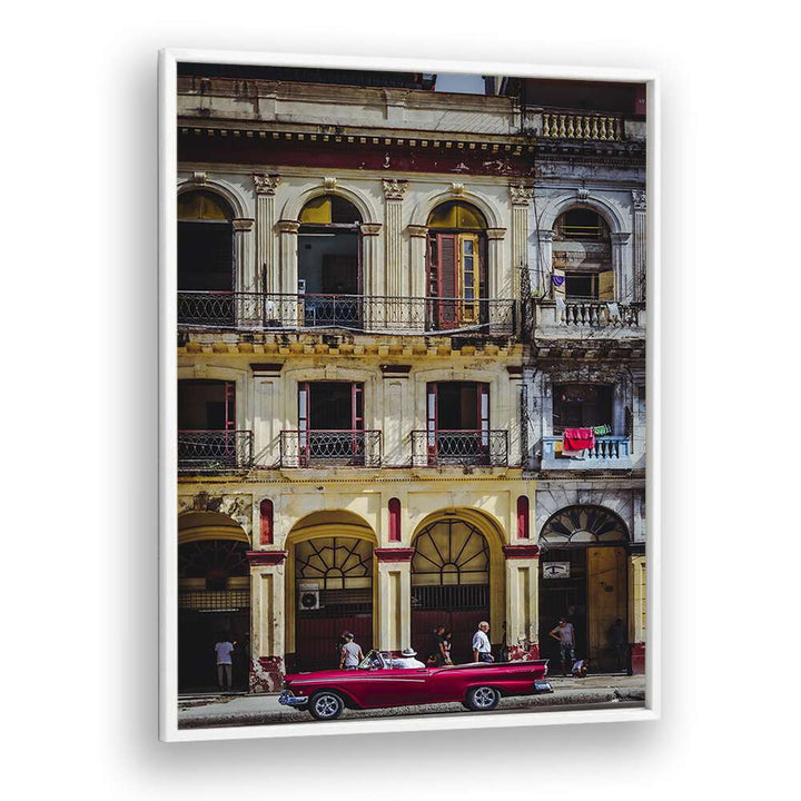 Vibrant red car parked on a charming Habana street, showcasing the beauty of Cuba in our photography prints.