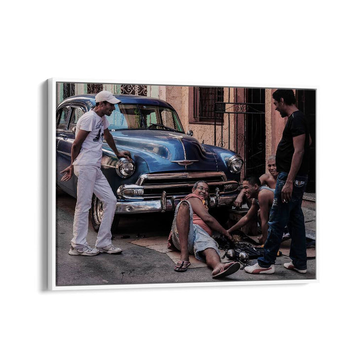 Capturing the essence of REPAIRING A CAR, PHOTOGRAPHY PRINTS showcases urban artistry and mechanical mastery.
