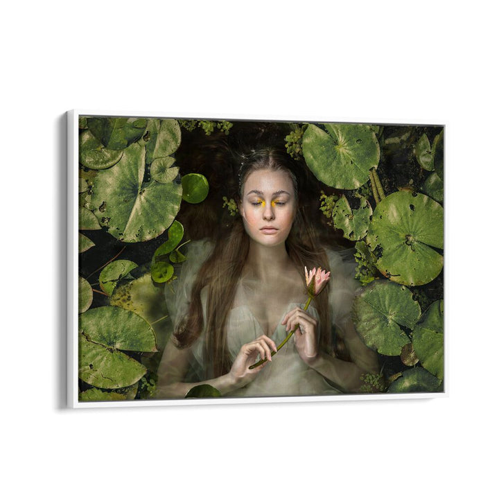 Serene scene featuring a woman among lily pads, embodying the essence of SILENT DREAM, PHOTOGRAPHY PRINTS.