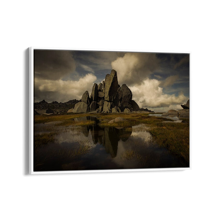 Majestic rocks reflected in water, showcasing STANDING ALONE, PHOTOGRAPHY PRINTS that capture nature's beauty.