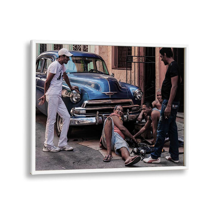 Capture the essence of urban life with "REPAIRING A CAR , PHOTOGRAPHY PRINTS," showcasing a vibrant car repair scene.