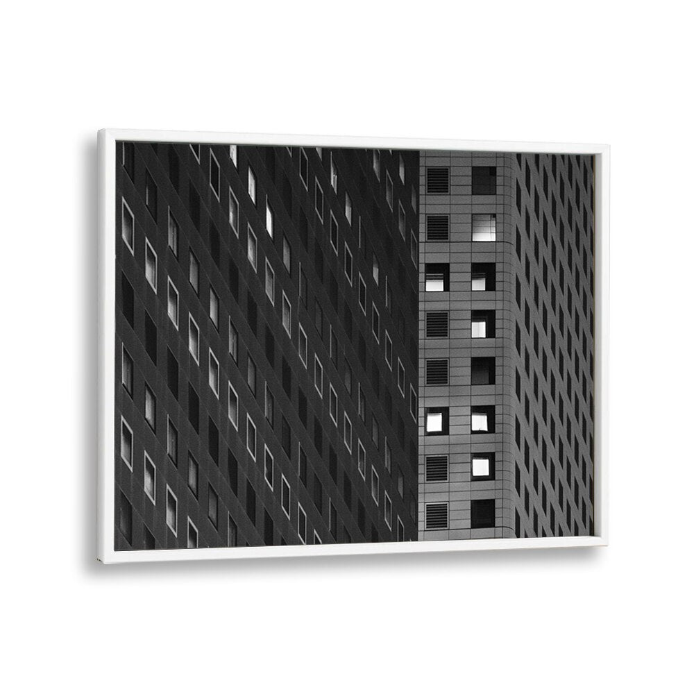 Explore urban life with SQUARES, PHOTOGRAPHY PRINTS, featuring striking architectural contrasts in black and white.