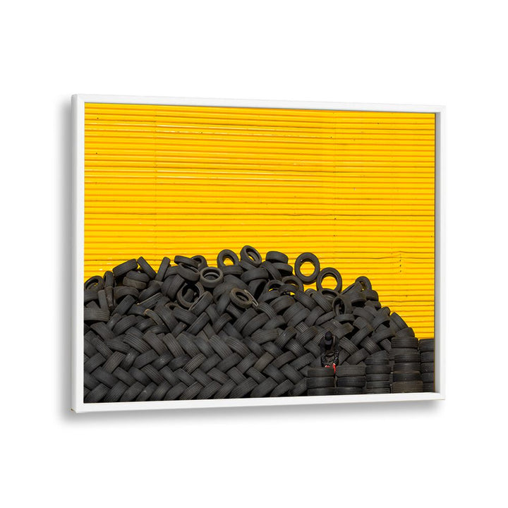 Fine art TIRES, PHOTOGRAPHY PRINTS showcasing urban life against a vibrant yellow backdrop. Perfect for artistic expression.