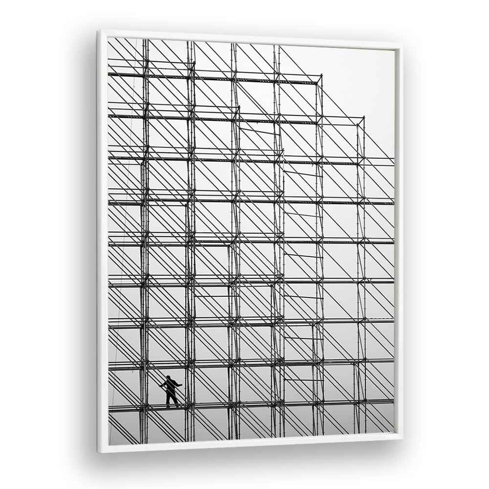Black-and-white CUBE, PHOTOGRAPHY PRINTS showcase a worker amidst a geometric scaffolding design, enhancing art photography.