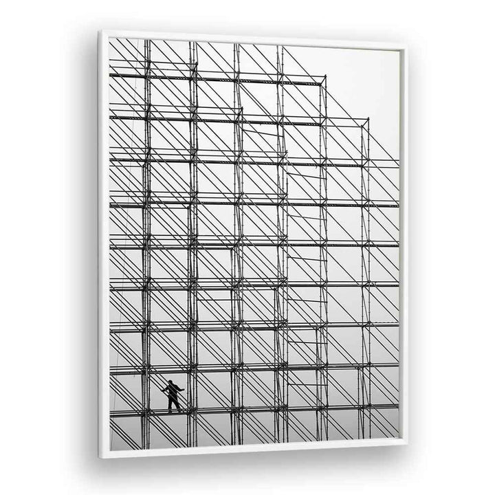 Black-and-white CUBE, PHOTOGRAPHY PRINTS showcase a worker amidst a geometric scaffolding design, enhancing art photography.