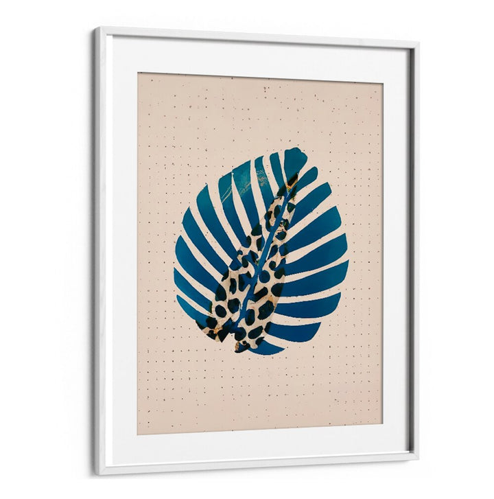 LEOPALM , FLORAL FLOWER PAINTINGS featuring a blue tropical leaf with leopard print detail in a white frame.