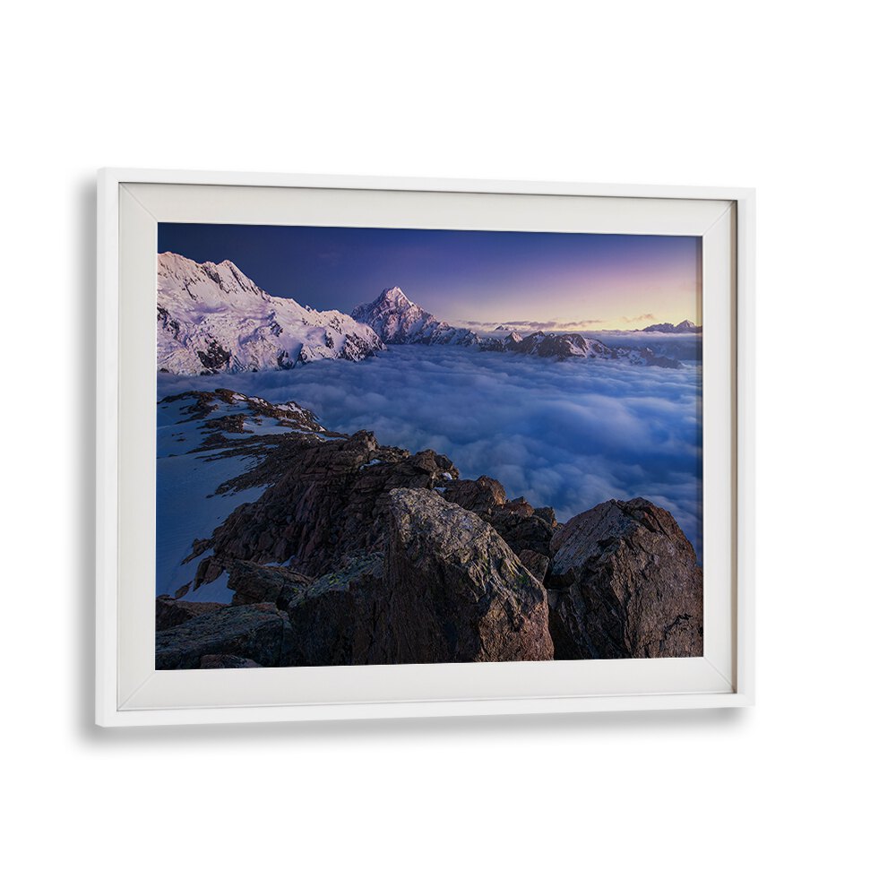 Stunning "Above the Clouds" photography prints showcasing breathtaking mountain vistas in a stylish frame.