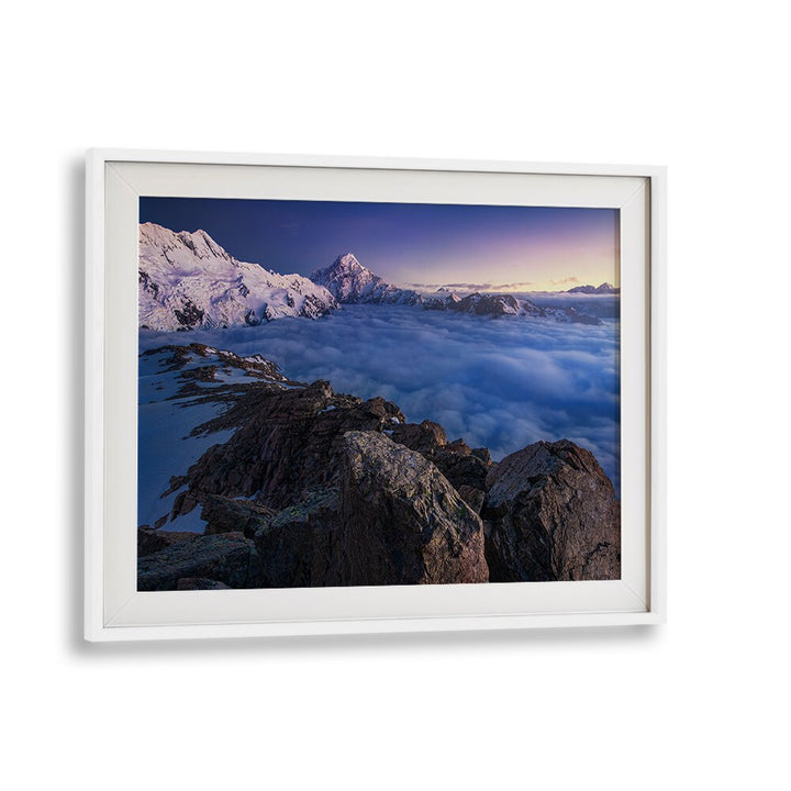 Stunning "Above the Clouds" photography prints showcasing breathtaking mountain vistas in a stylish frame.