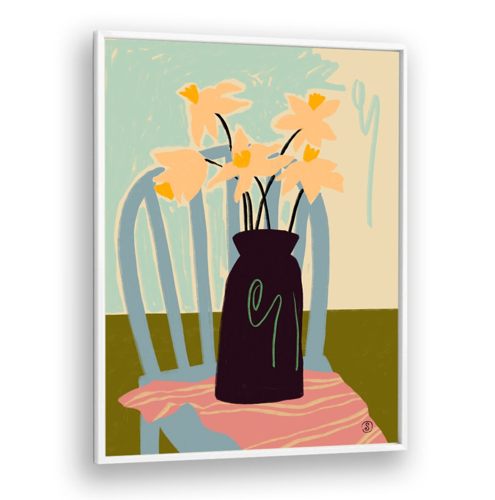 Bright daffodils in a vase bring vibrant color and elegance to any space, perfect for home decor enthusiasts.