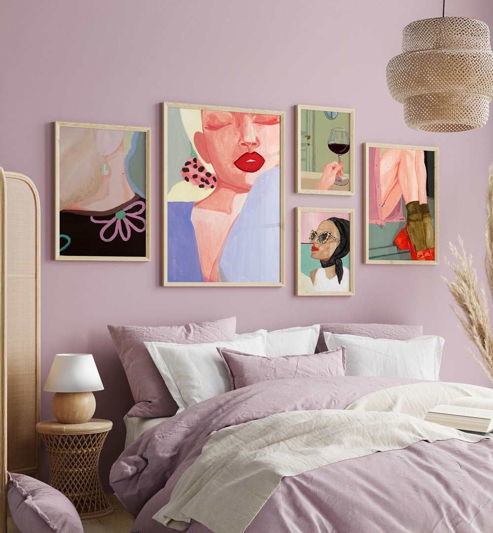 Stylish display of THE ART OF HER GALLERY WALL, GALLERY WALLS featuring vibrant portraits and modern elegance.