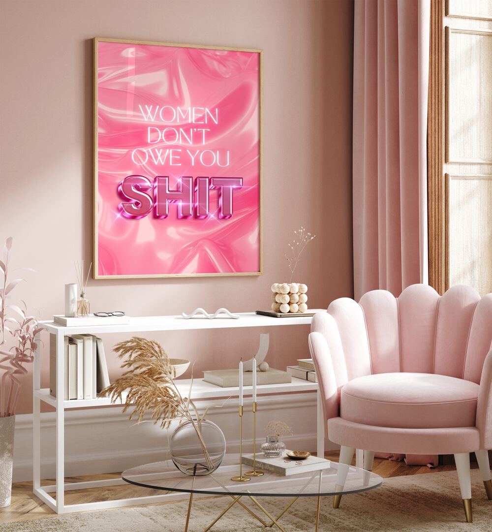 Bold typography poster featuring the empowering quote "WOMEN DON'T OWE YOU SHIT," perfect for modern decor.
