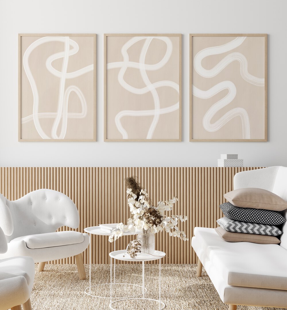 Stylish living room featuring WHITE BRUSH STROKES, SET OF 3 PAINTINGS, perfect for modern home decor.
