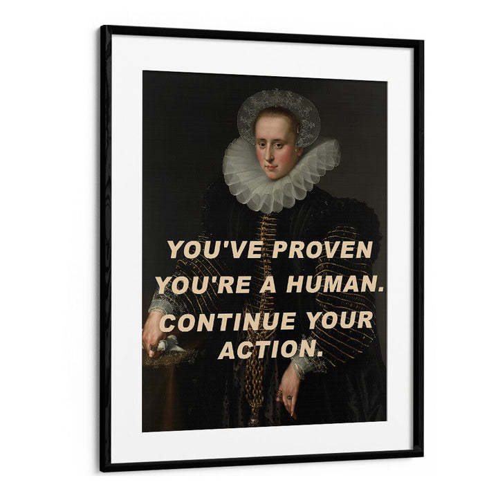 Striking YOU'RE A HUMAN , ALTERED ART PRINTS in a black frame, perfect for adding elegance to any space.