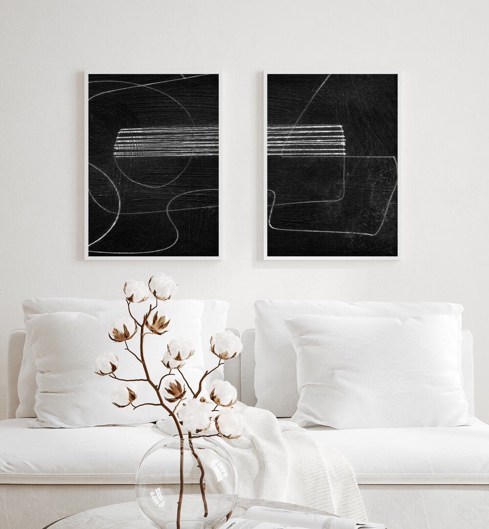 Elevate your decor with the ABSTRACTION BLACK SET, SET OF 2 PAINTINGS, perfect for modern sophistication.