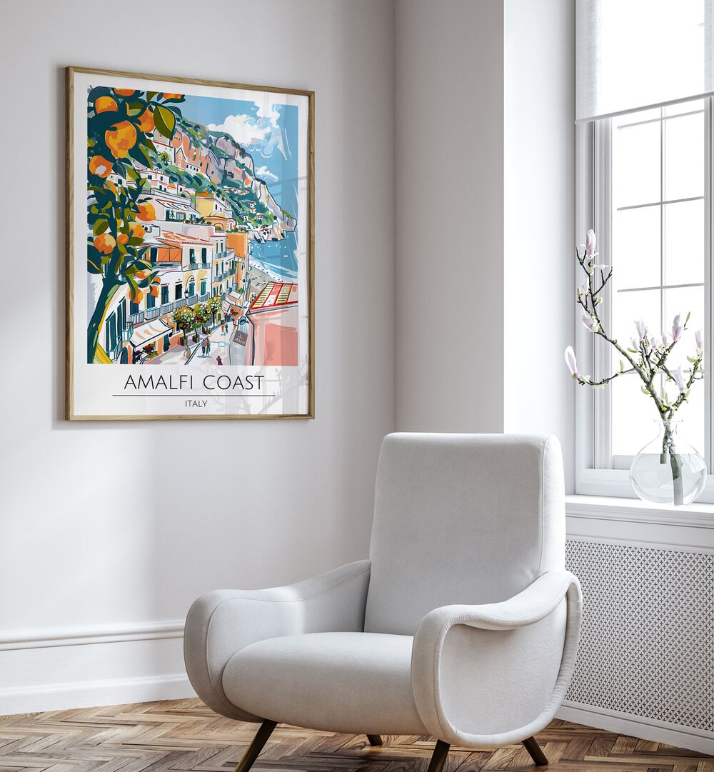 Stunning AMALFI COAST - ITALY, TRAVEL POSTERS adorn a modern living room, highlighting vibrant coastal beauty.