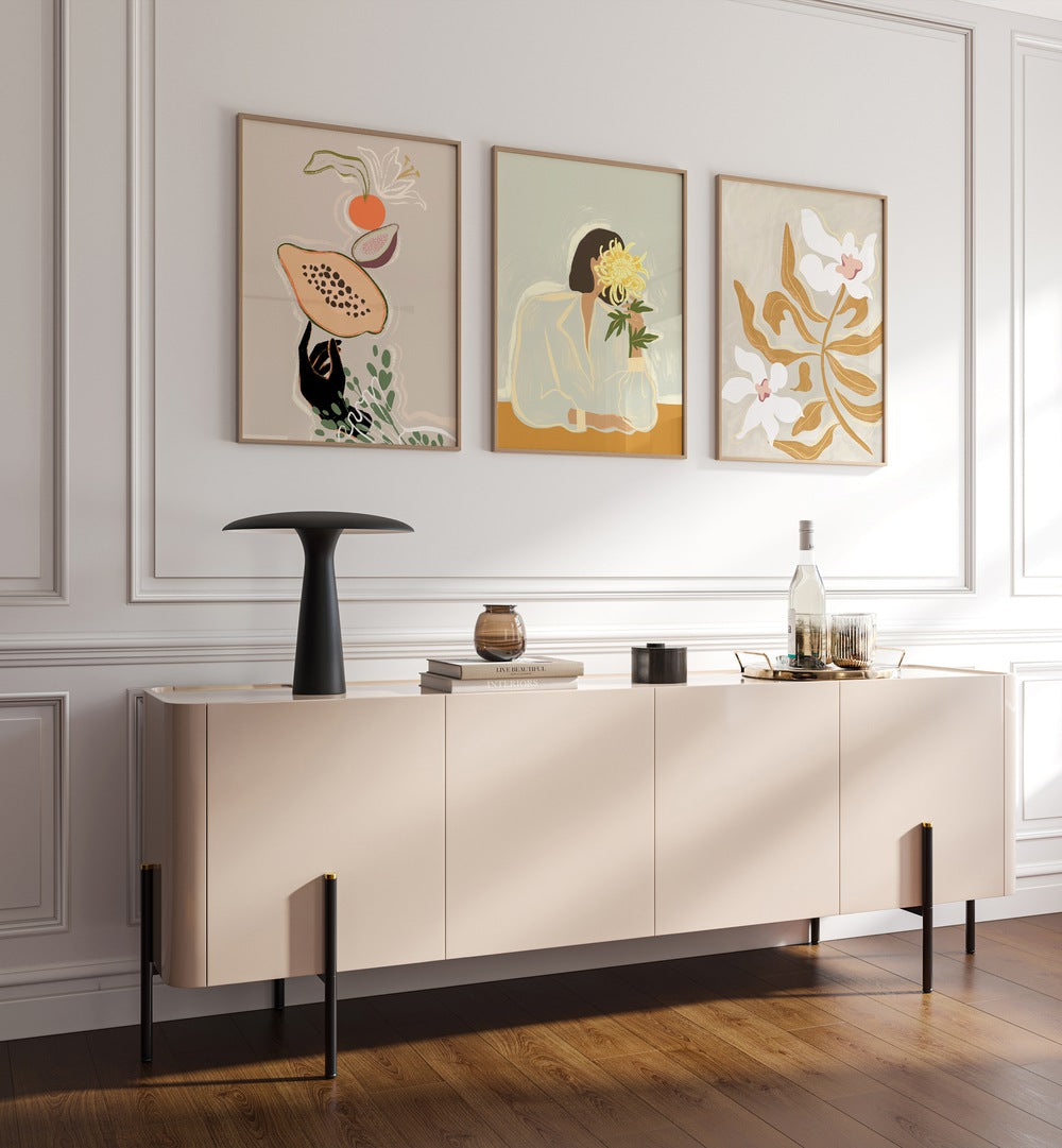 Brighten your space with the ARTY GUAVA ARTWORKS SET II, SET OF 3 PAINTINGS, a vibrant botanical collection.