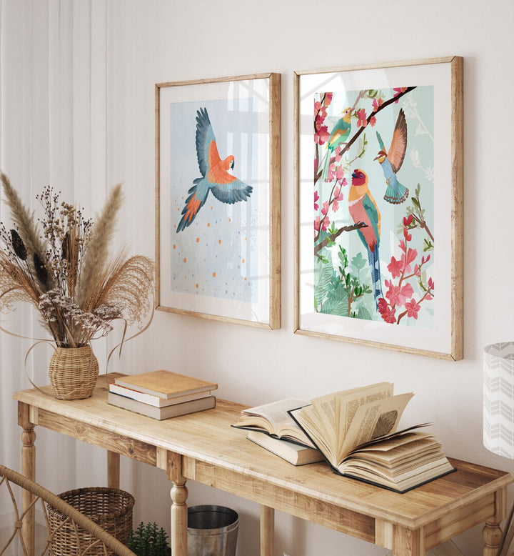 Enhance your decor with BIRDS ON HIGH, SET OF 2 PAINTINGS, featuring vibrant designs of an eagle and a summer bird.