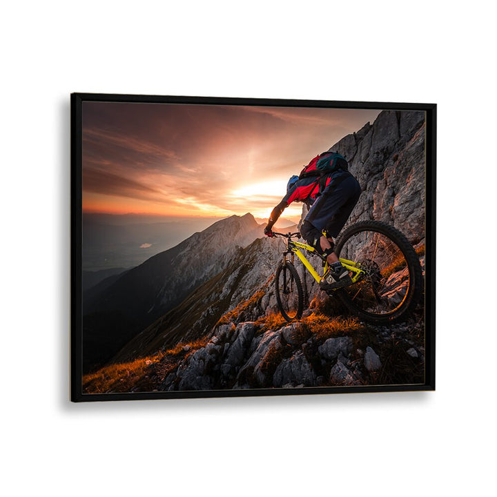 Mountain biker navigating rocky terrain at sunset, showcasing GOLDEN HOUR HIGH ALPINE RIDE, PHOTOGRAPHY PRINTS.