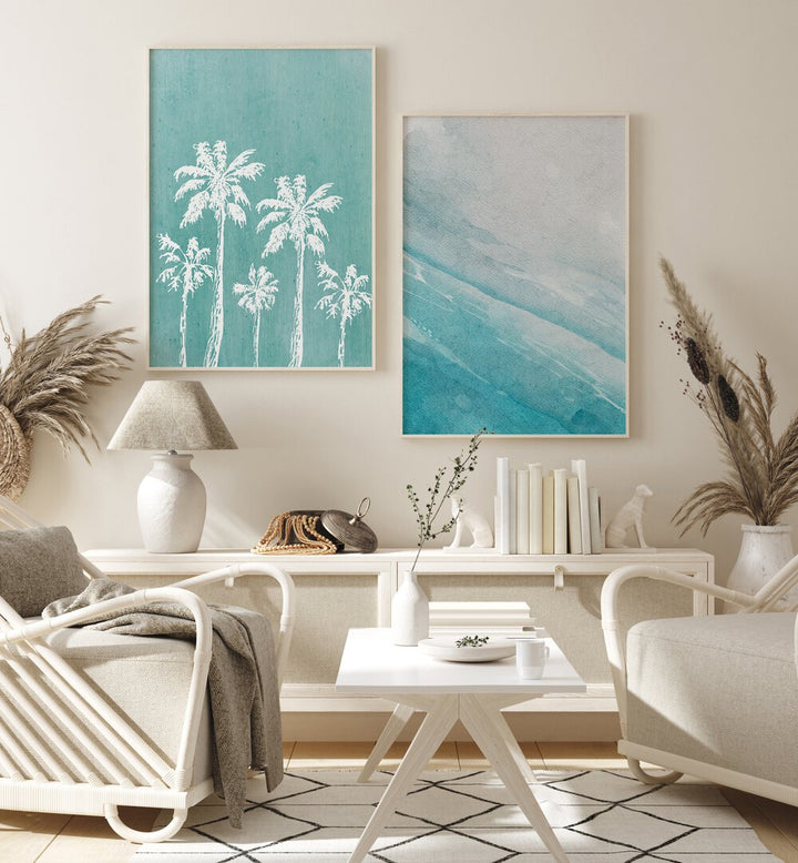 Transform your space with the BLUE OCEANIC SET, SET OF 2 PAINTINGS featuring serene palm trees and ocean hues.