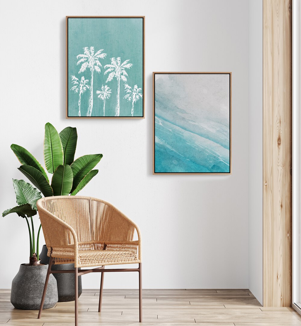 Transform your space with the BLUE OCEANIC SET, SET OF 2 PAINTINGS featuring serene ocean and palm tree designs.
