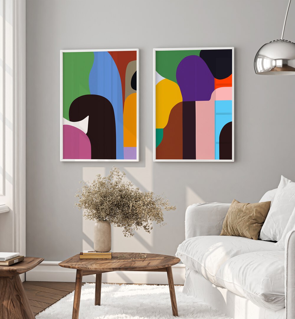 Brighten your space with the COLOURFUL PEOPLE, SET OF 2 PAINTINGS featuring vibrant abstract designs.