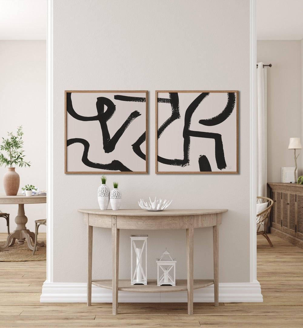 Elevate your decor with the CURVY LINES SET, SET OF 2 PAINTINGS featuring bold black strokes on white backgrounds.