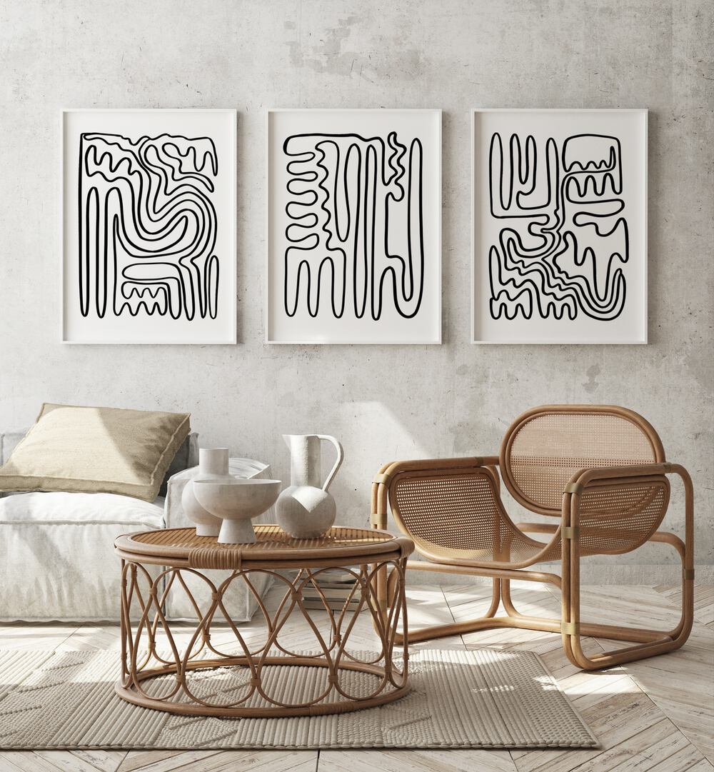 Stylish living room featuring DOODLE ART, SET OF 3 PAINTINGS, enhancing contemporary bohemian decor.