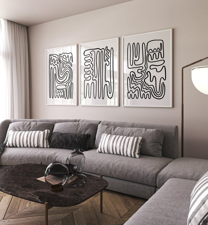 Stylish living room featuring the modern DOODLE ART, SET OF 3 PAINTINGS for a chic, bohemian touch.
