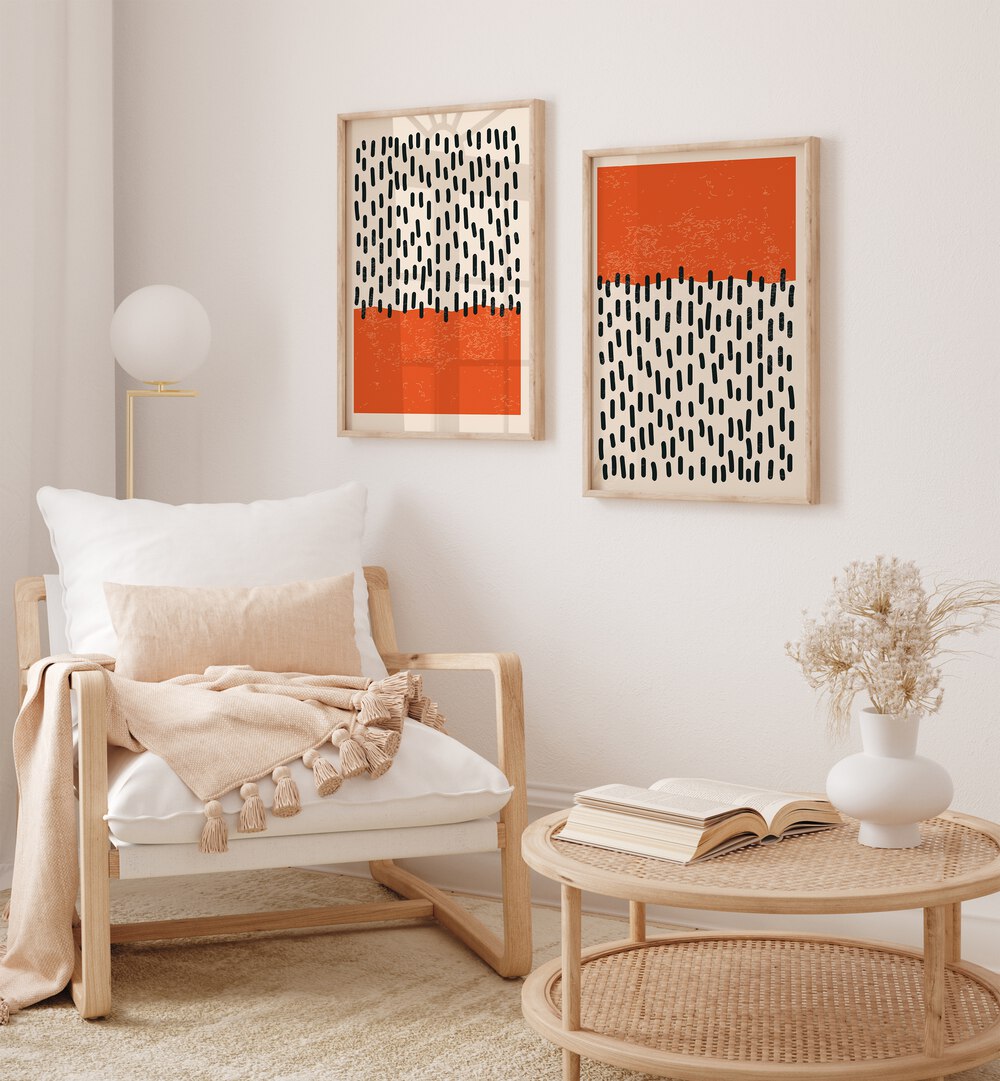 Brighten your space with DOTS & STROKES, SET OF 2 PAINTINGS featuring bold orange and black designs.
